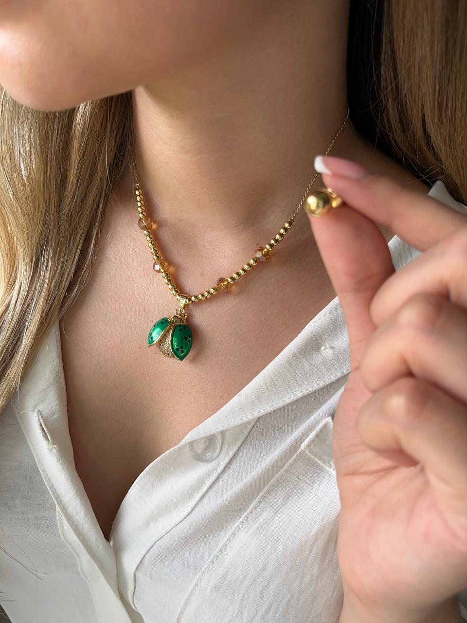 Set de cadena con dije de insecto