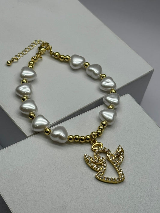 Pulsera con perla y dije de angel