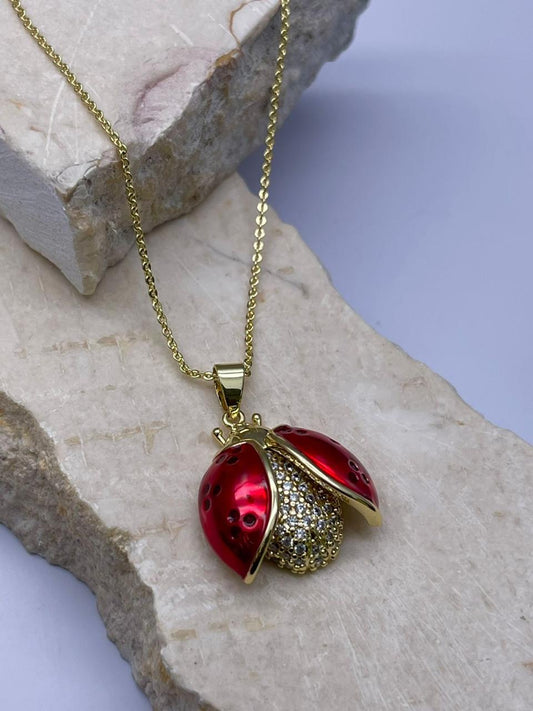 Cadena con dije de insecto